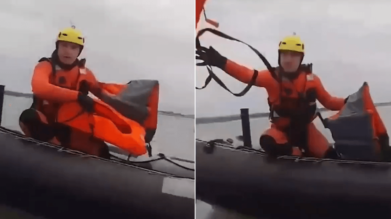 French Navy throw life vests to small boat migrants