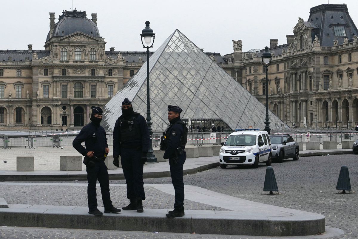French Police outside the Louvre Museum in central Paris