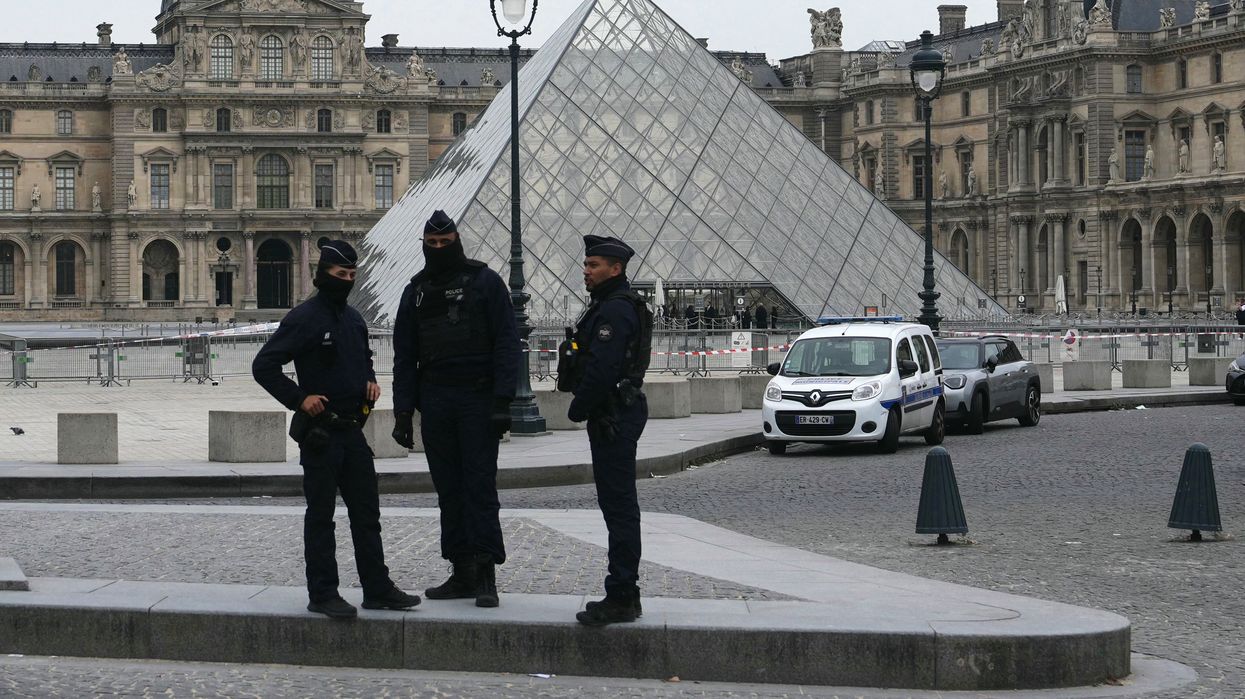 French Police outside the Louvre Museum in central Paris