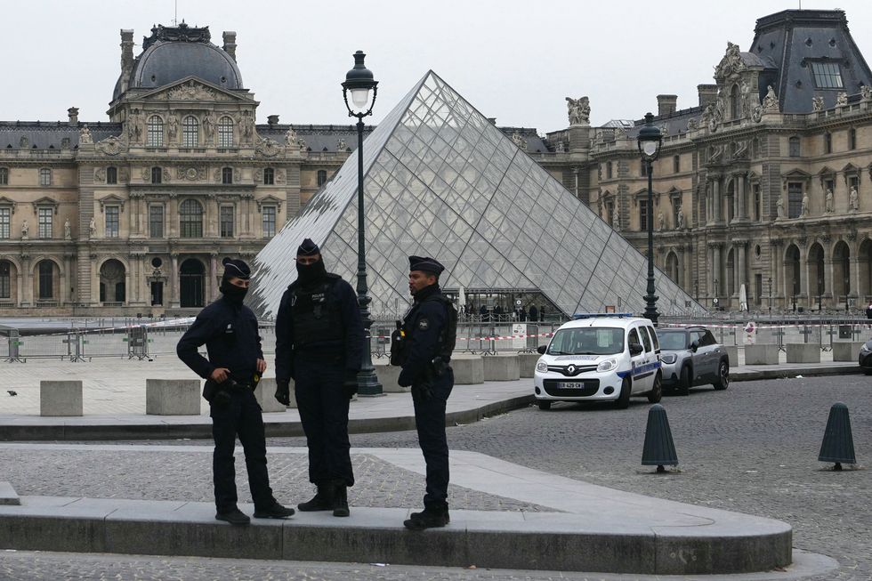 French Police outside the Louvre Museum in central Paris