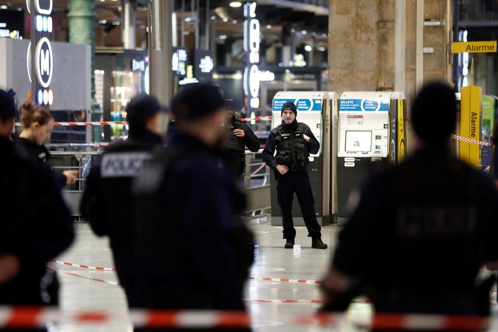 French police secure the area after a man with a knife wounded several people at the Gare du Nord train station in Paris, France, January 11, 2023. REUTERS/Benoit Tessier
