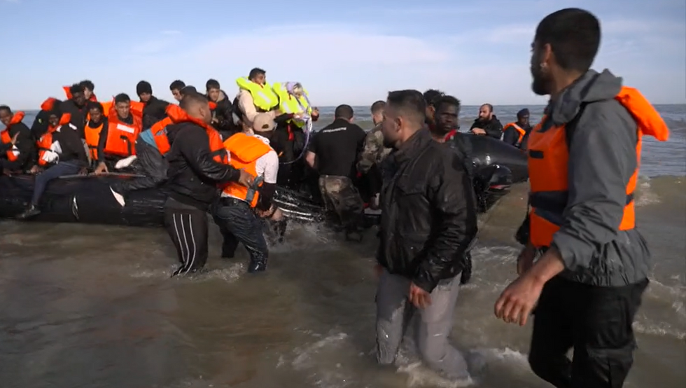 French police slash migrant boat filled with people for FIRST time before it leaves shore