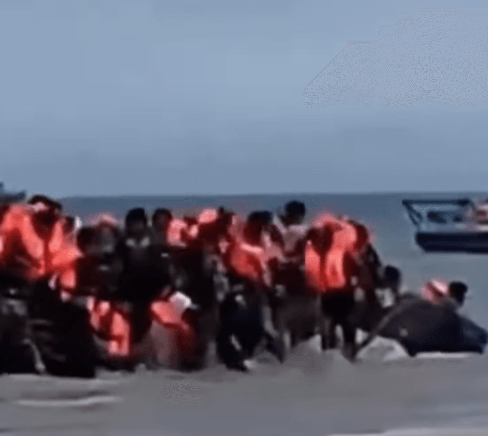 French police slash migrant boat