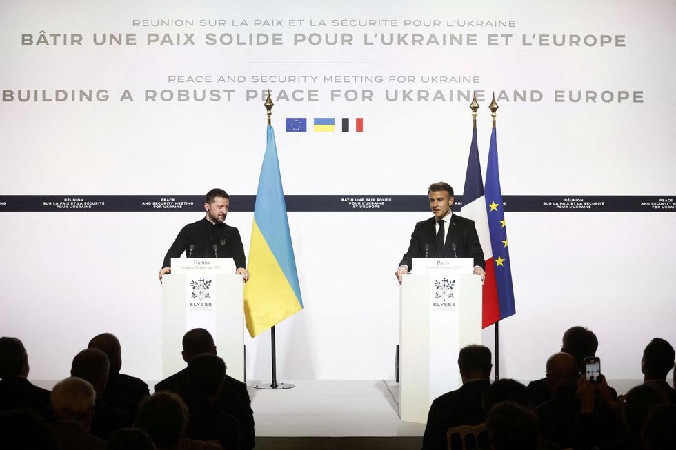 French President Emmanuel Macron and Ukrainian President Volodymyr Zelensky give a press conference