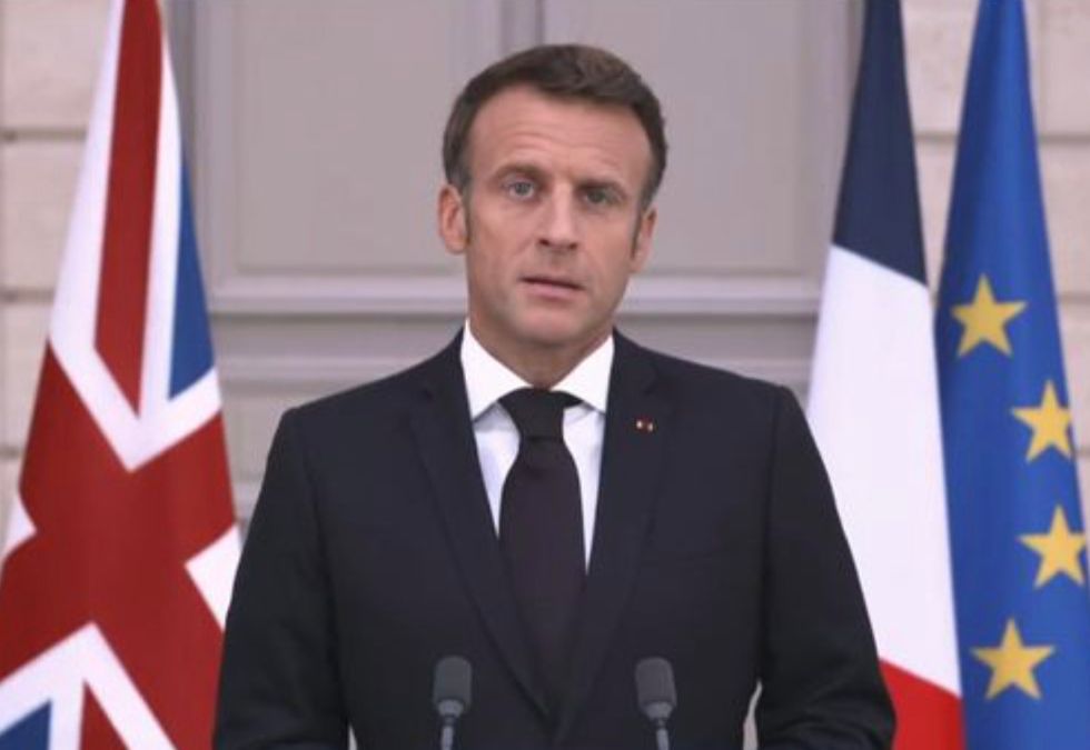 French President Emmanuel Macron paying tribute to Queen Elizabeth II
