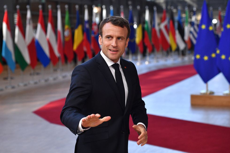 French President Emmanuel Macron talks to the media ahead of a European Council meeting