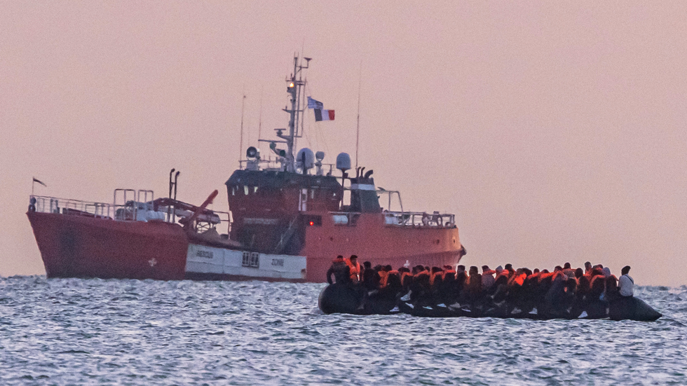 French vessel following a migrant boat