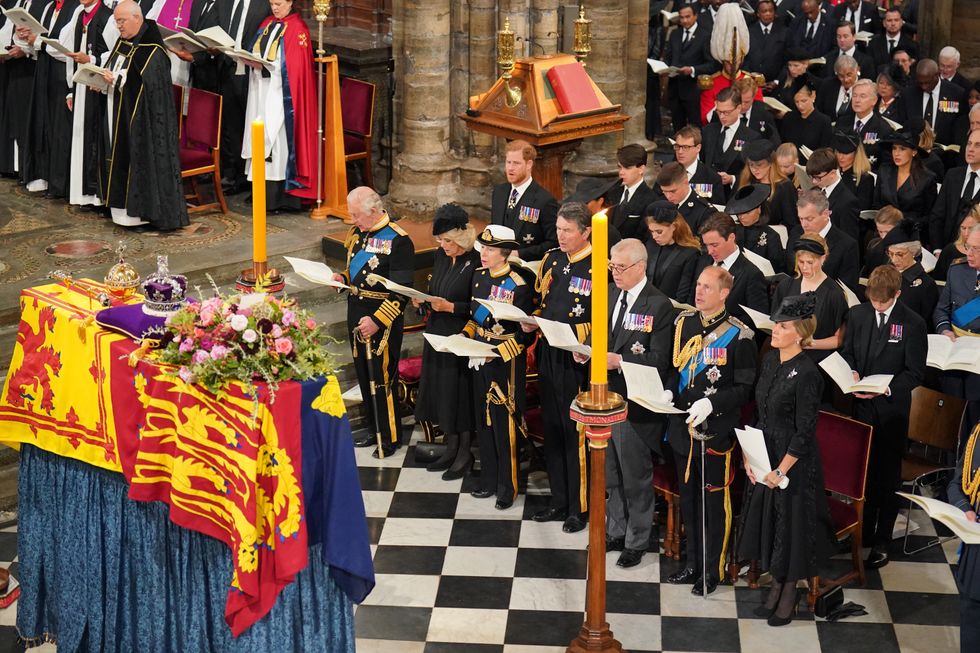 (front row) King Charles III, the Queen Consort, the Princess Royal, Vice Admiral Sir Tim Laurence, the Duke of York, the Earl of Wessex, the Countess of Wessex, (second row) the Duke of Sussex, the Duchess of Sussex, Princess Beatrice, Edoardo Mapelli Mozzi and Lady Louise Windsor and James, Viscount Severn, and (third row) Samuel Chatto, Arthur Chatto, Lady Sarah Chatto, Daniel Chatto and the Duchess of Gloucester in front of the coffin of Queen Elizabeth II during her State Funeral at the Abbey in London. Picture date: Monday September 19, 2022.