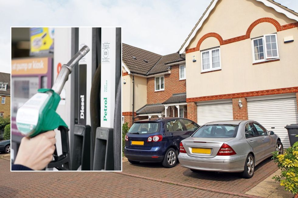 Fuel pump and cars parked on a driveway outside a home