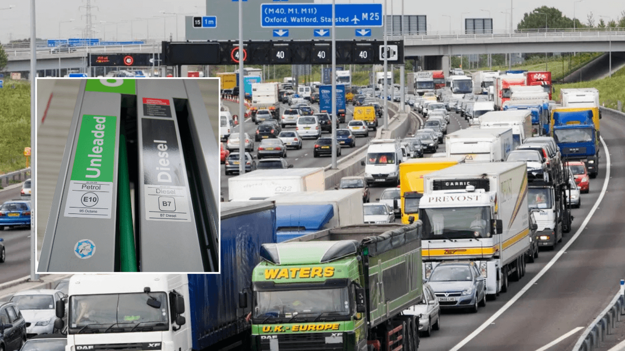Fuel station and HGVs on road