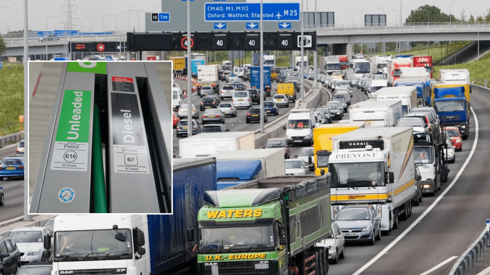 Fuel station and HGVs on road