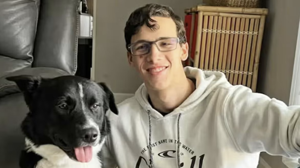 Gabriel Tanner along with pooch Axel