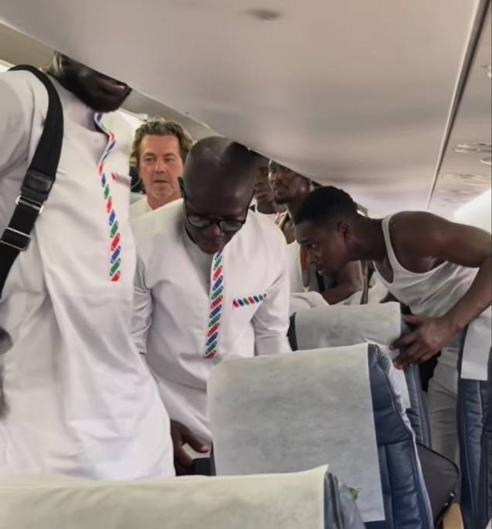 Gambia players and staff made a quick exit from the plane