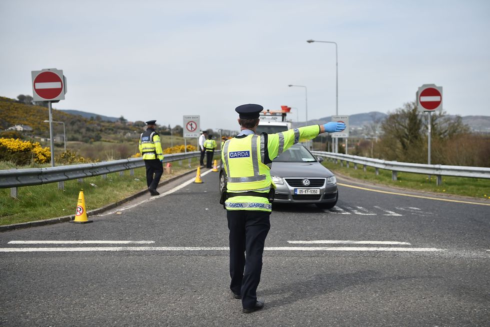 Garda officer directing traffic