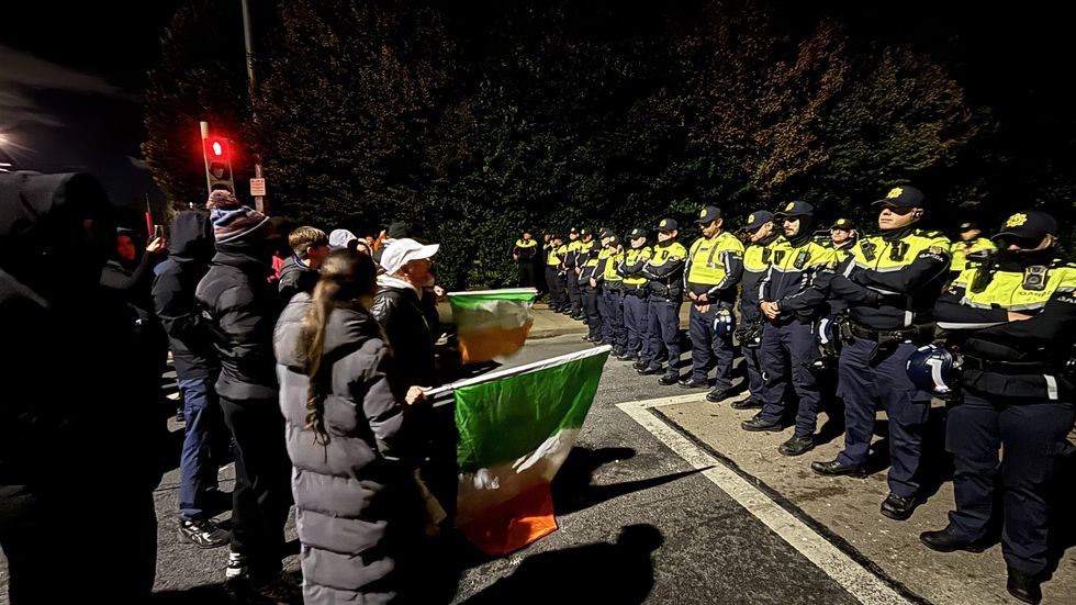 Gardai officers in Dublin migrant protests