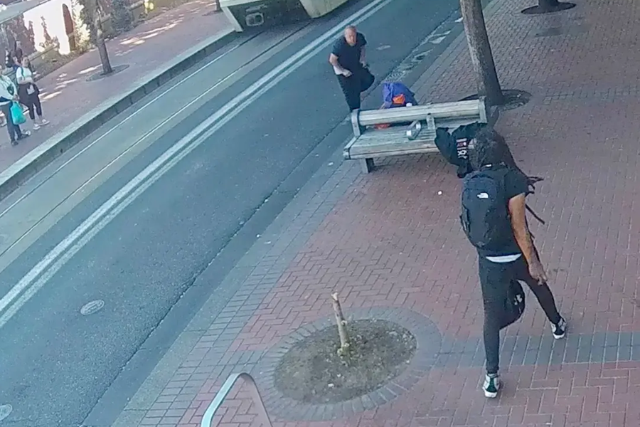 Gary Edwards approaches Gregory Howards Jr, holding a knife