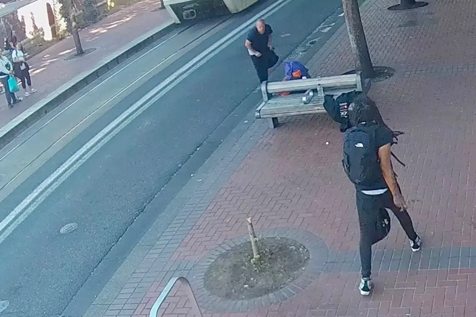 Gary Edwards approaches Gregory Howards Jr, holding a knife