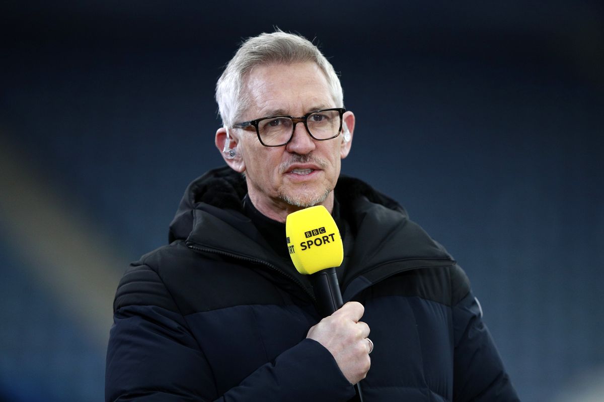 Gary Lineker holding a microphone