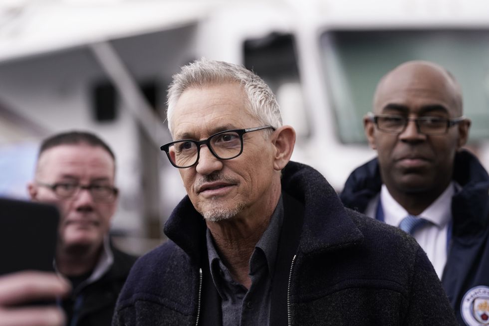 Gary Lineker wearing glasses and coat turned up at the collar