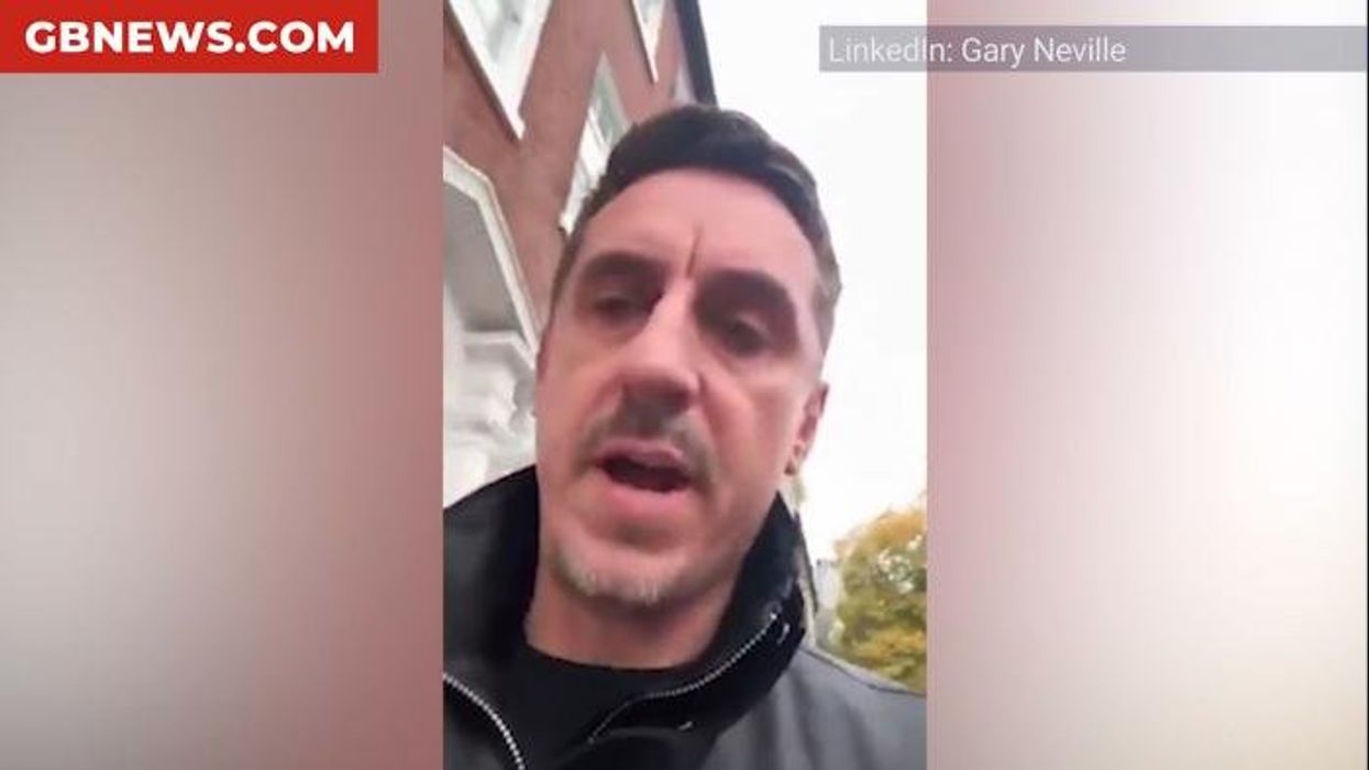 Gary Neville faces wrath of his own fans as Salford City supporters unveil banner declaring him a 'traitor' and 'scum' after Union Flag row
