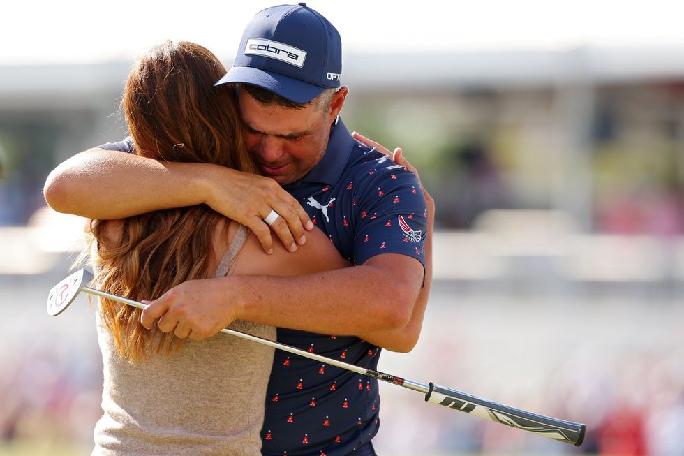 Gary Woodland hugged his wife after his victory at the Texas Childrens Houston Open
