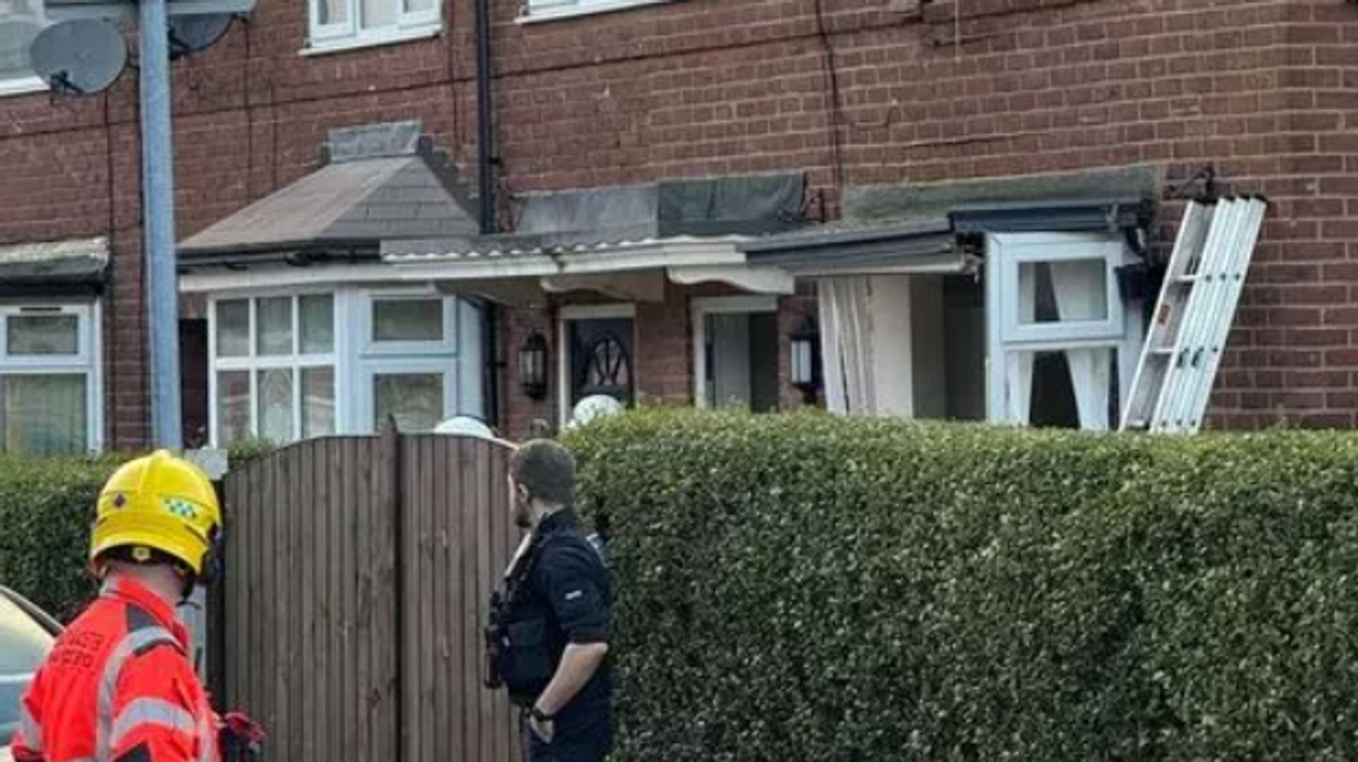 'Gas explosion' rips through house in Manchester as emergency services rush to the scene