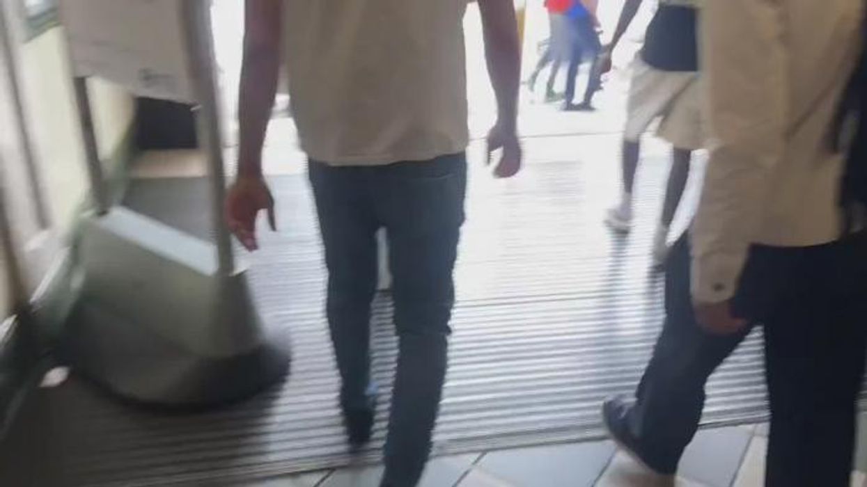 Policewoman punched and kicked after trying to stop fare-dodgers