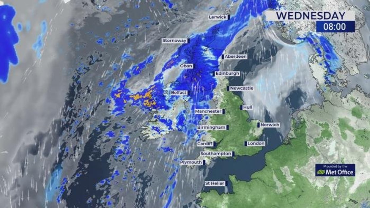 Firefighters forced to use boats to save residents from flooding on major north London road