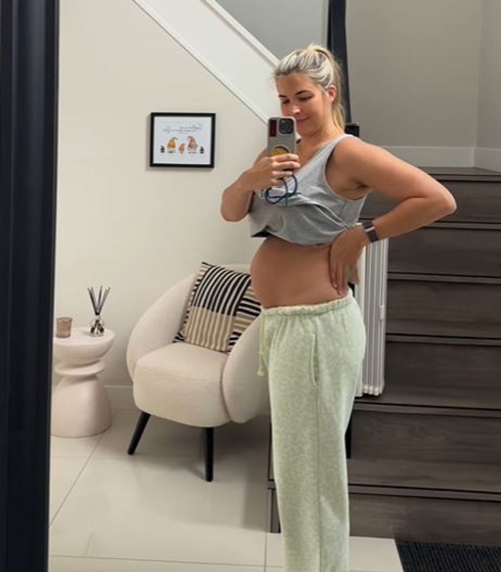 Gemma Atkinson paraded in front of a mirror