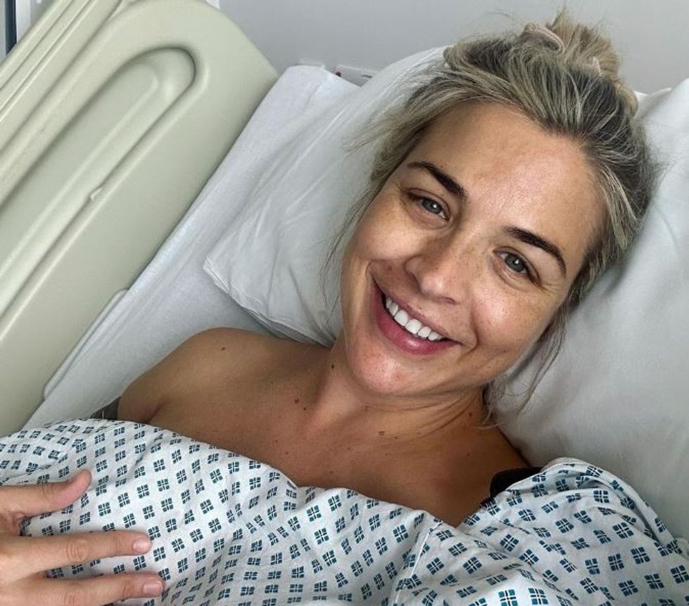 Gemma Atkinson smiles in snap from hospital bed