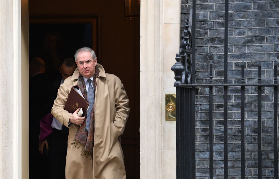 General Attorney Geoffrey Cox leaves Downing Street, London, after a National Security Council meeting.