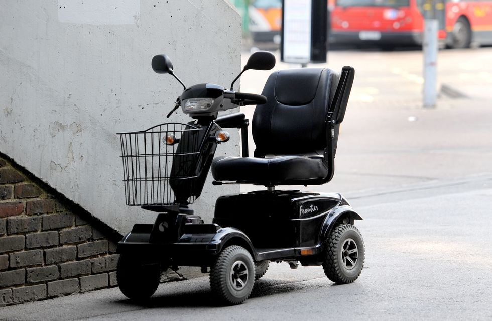 General view of a parked disability scooter in Harlow, Essex.