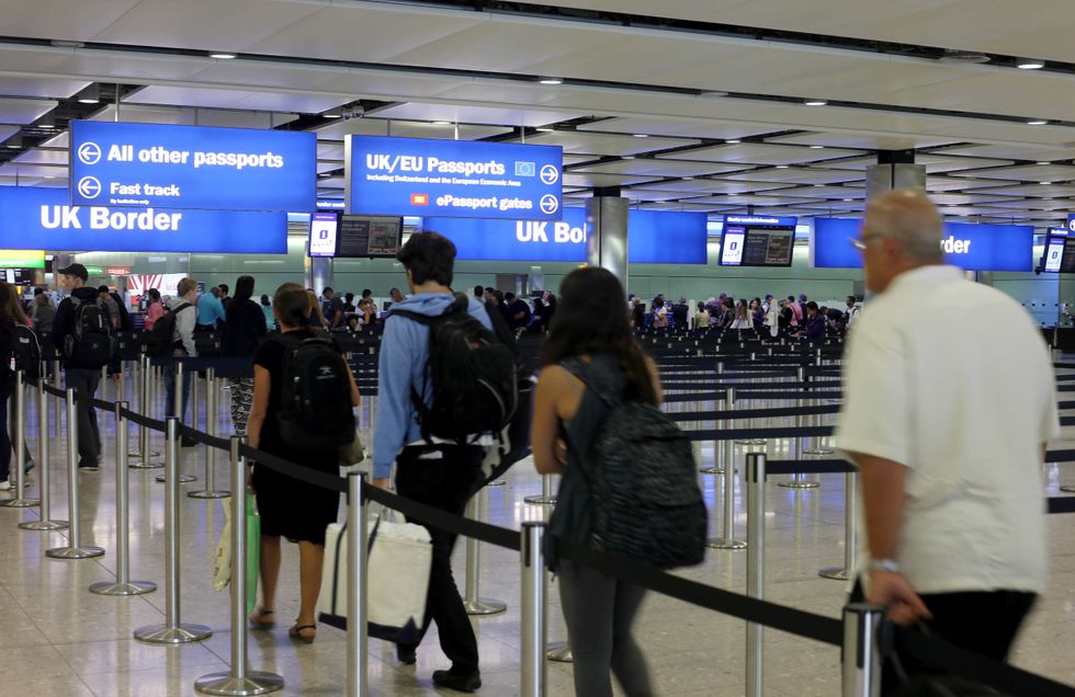 General view of passengers going through UK Border at Terminal 2 of Heathrow Airport.