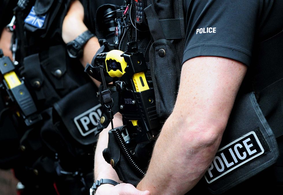 General view of Taser gun as worn by police .