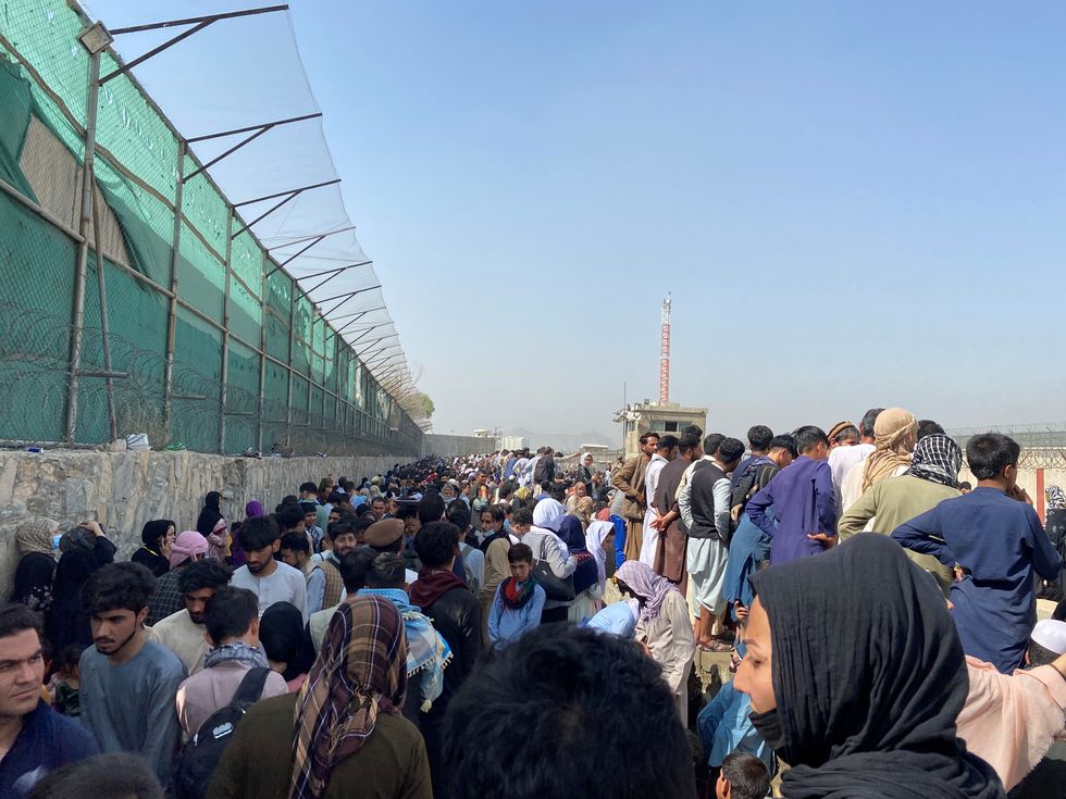 General view of the crowds of people near the airport in Kabul.