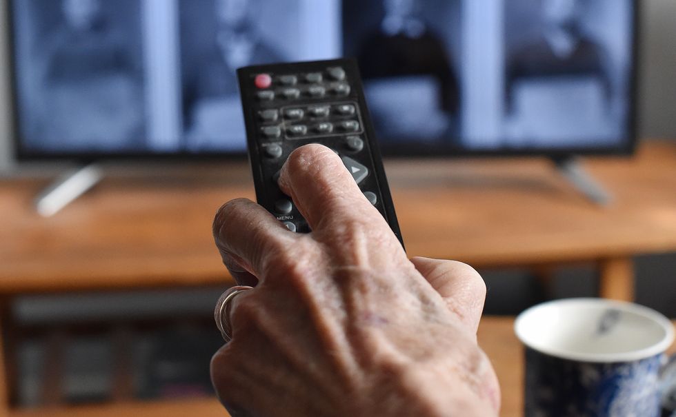 Generic old person watching TV. TV Licensing customers over 75 will remain covered by a free TV licence until 31 May 2020. PA Photo. Picture date: Wednesday January 15, 2020. Following the BBCs policy announcement on the future of the over 75s TV Licence fee, TV Licensing is advising customers currently receiving a free licence that they need not take any immediate action and that they will be supported through the changes when the current arrangement for free over 75 licences paid for by the UK Government comes to an end next year. Further to a public consultation, the BBC has announced that from June next year the BBC will fund a free licence for over 75s in receipt of Pension Credit. Photo credit should read: Nick Ansell/PA Wire
