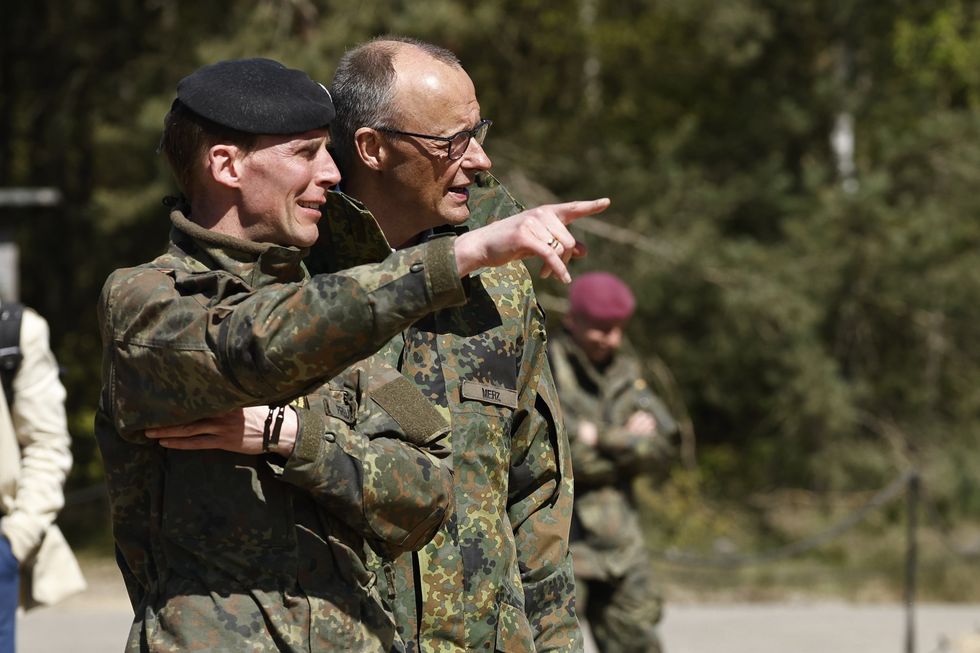 German Chancellor Friedrich Merz and Christian Freuding of the Army Christian Freuding