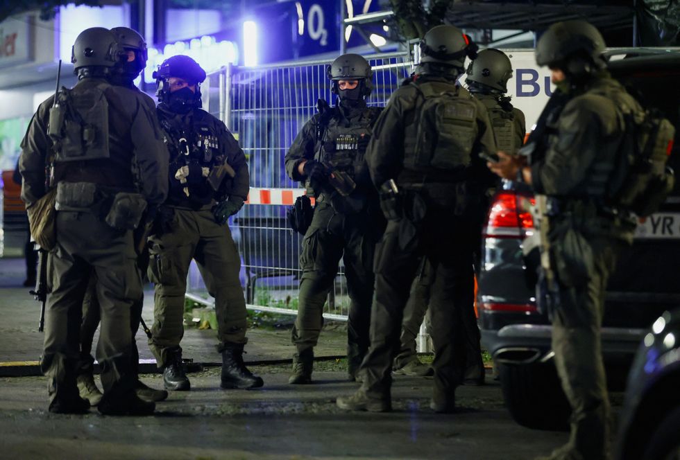 German special police forces work following the stabbing
