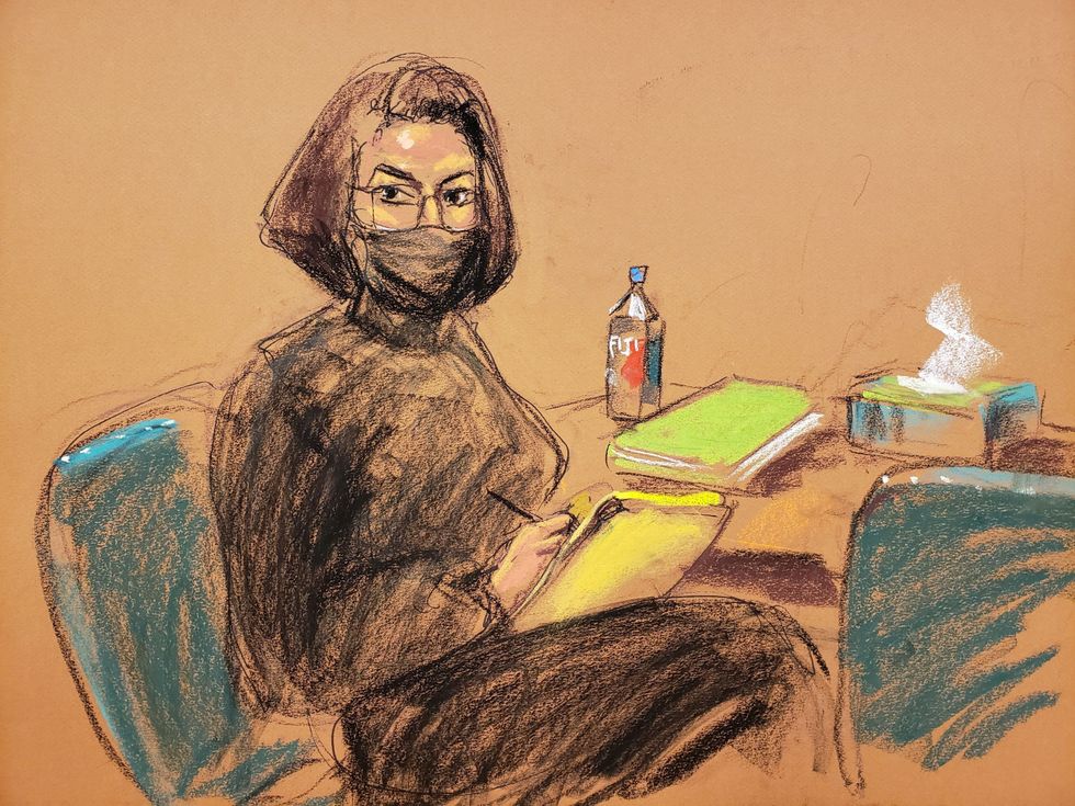 Ghislaine Maxwell turns to sketch court sketch artist Jane Rosenberg during the trial of Maxwell, the Jeffrey Epstein associate accused of sex trafficking, in a courtroom sketch in New York City, U.S., December 7, 2021. REUTERS/Jane Rosenberg     TPX IMAGES OF THE DAY