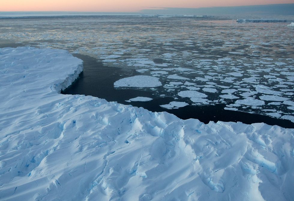 Giant tabular icebergs are surrounded by ice floe drift
