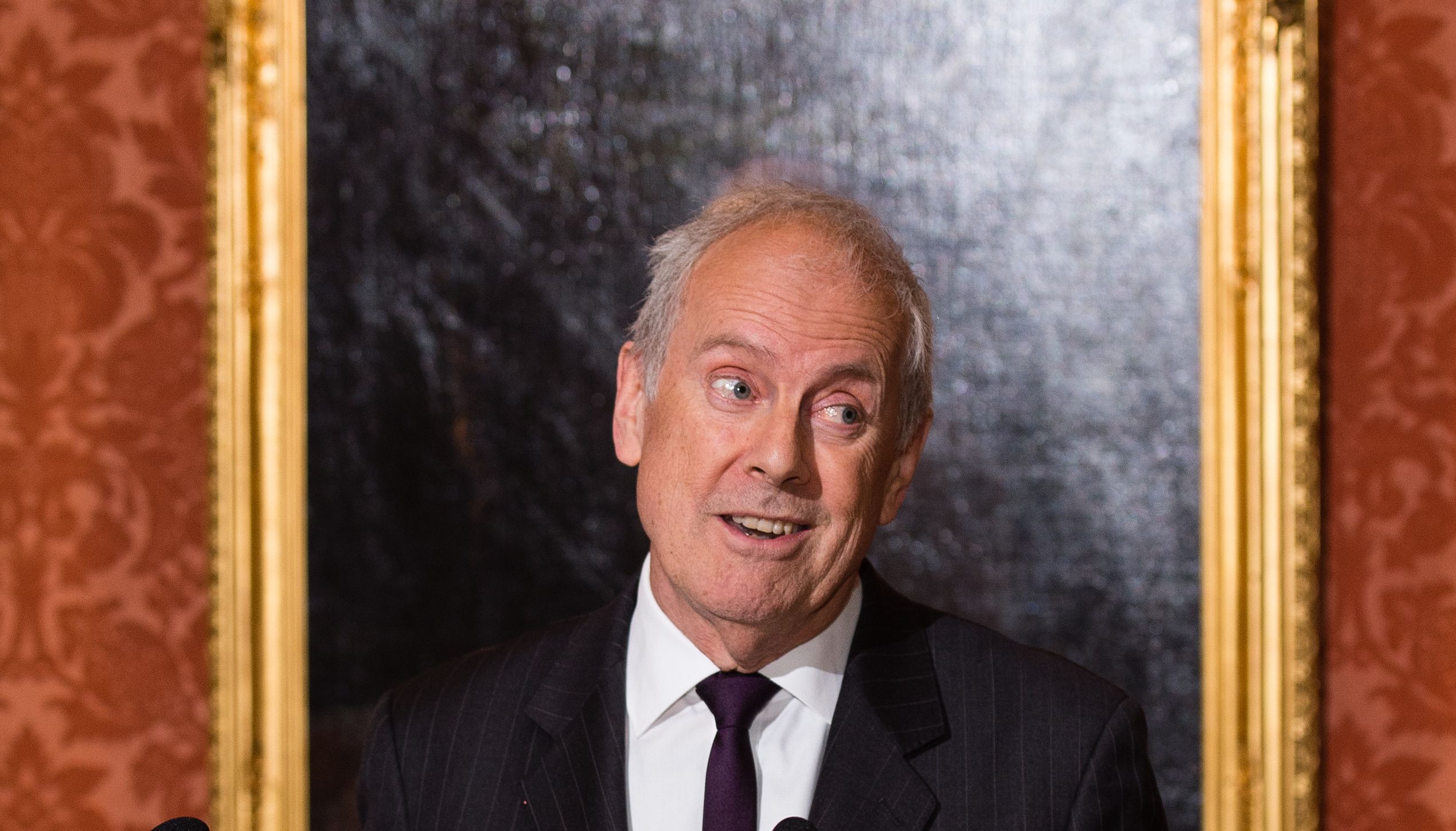 Giles Brandreth wrote to the Queen's private secretary to ask her if she would accept the award.