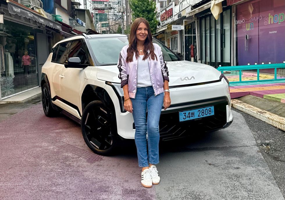 Ginny Buckley with the Car of the Year - the Kia EV3