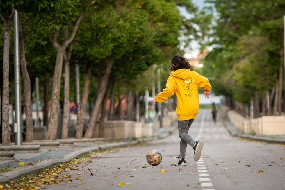 Girl playing in the street
