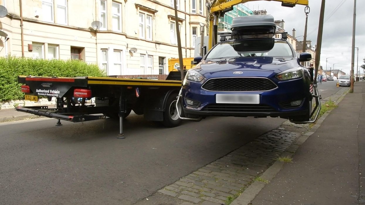 Glasgow City Council impounding a car