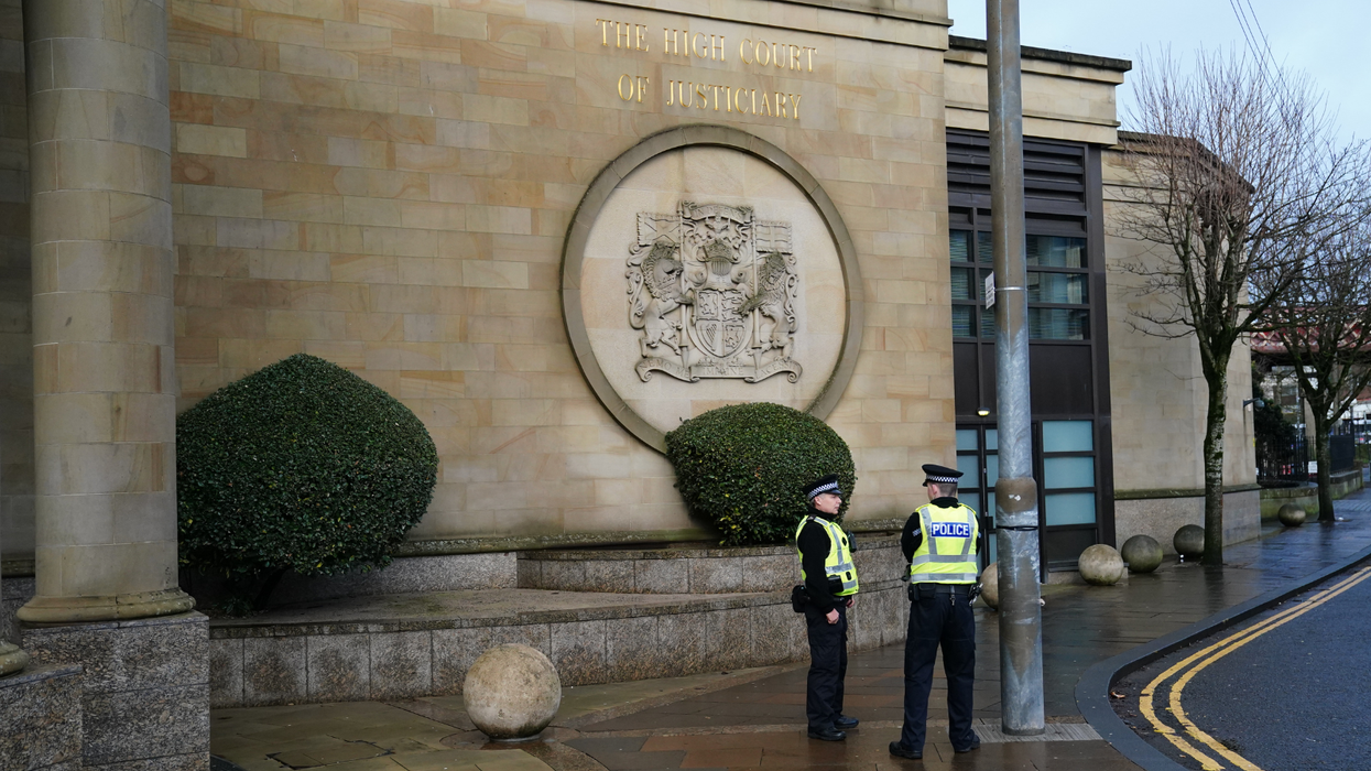 Glasgow High Court with police