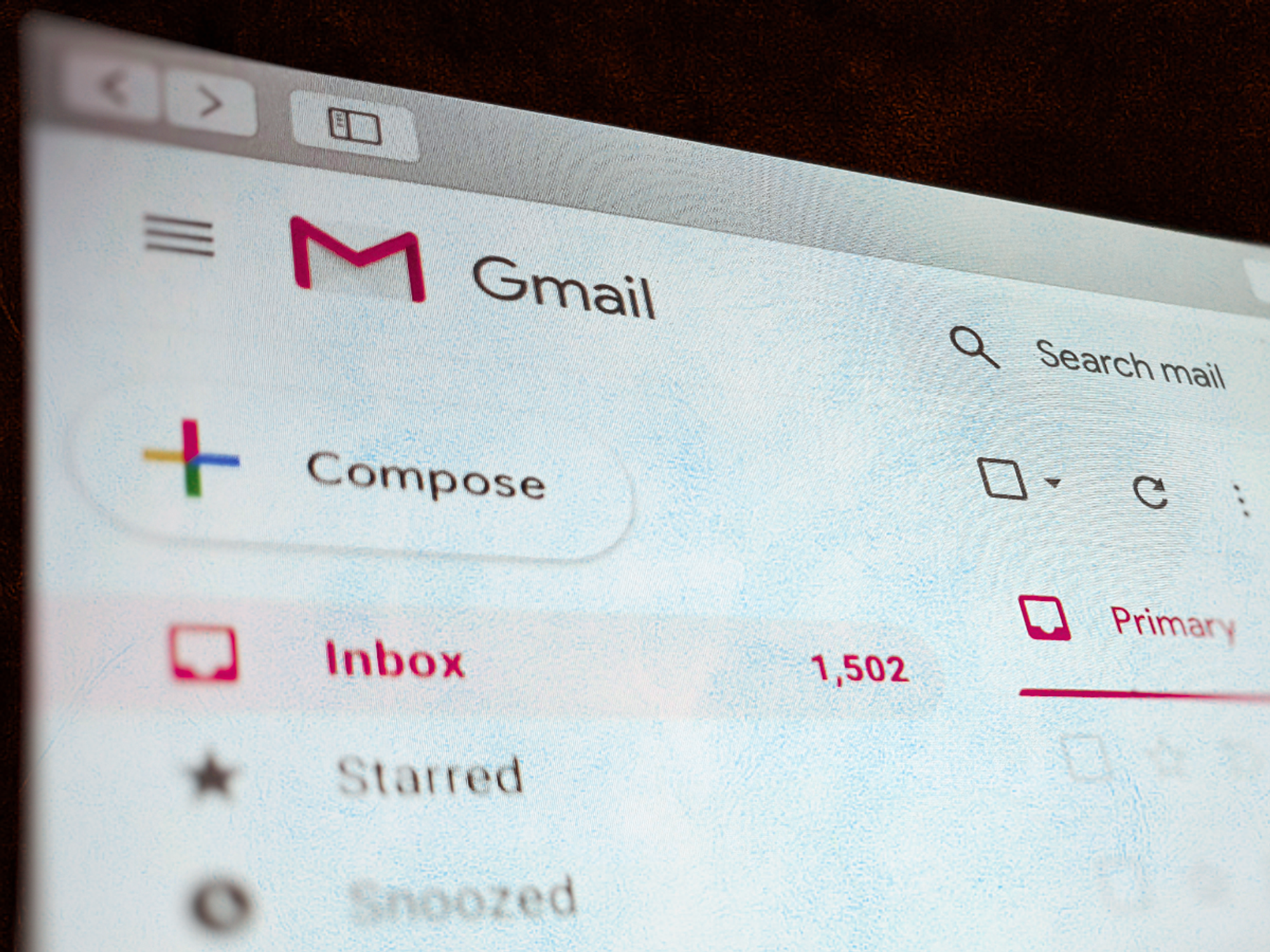 Gmail inbox shown from the side with a threatening red tinge