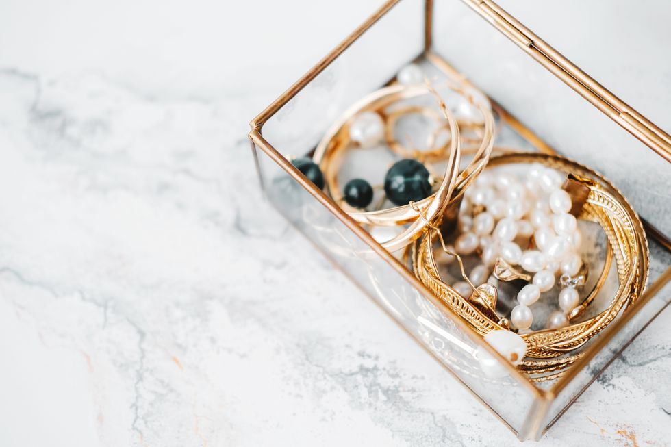 Golden bracelets, pearl necklace and jewellery