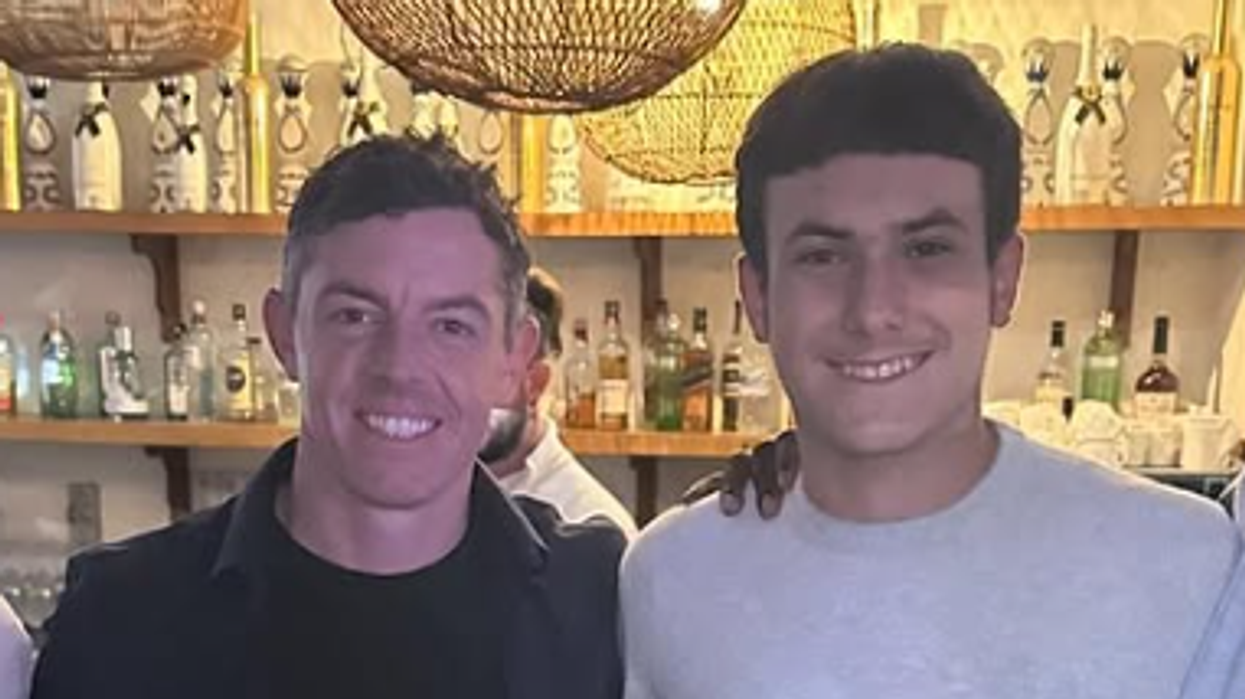 Golf prodigy Emanuele Galeppini and Rory McIlroy