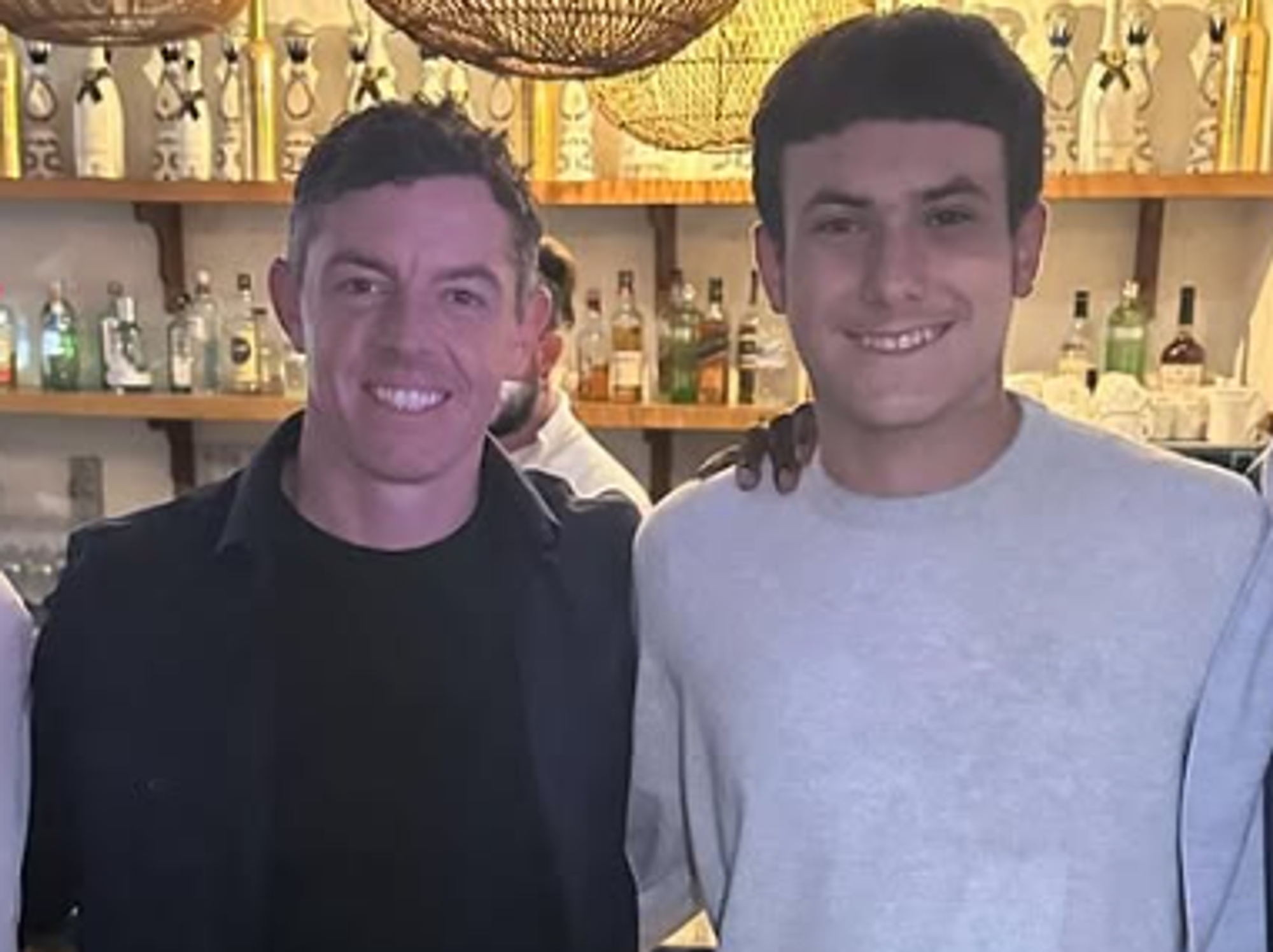 Golf prodigy Emanuele Galeppini and Rory McIlroy