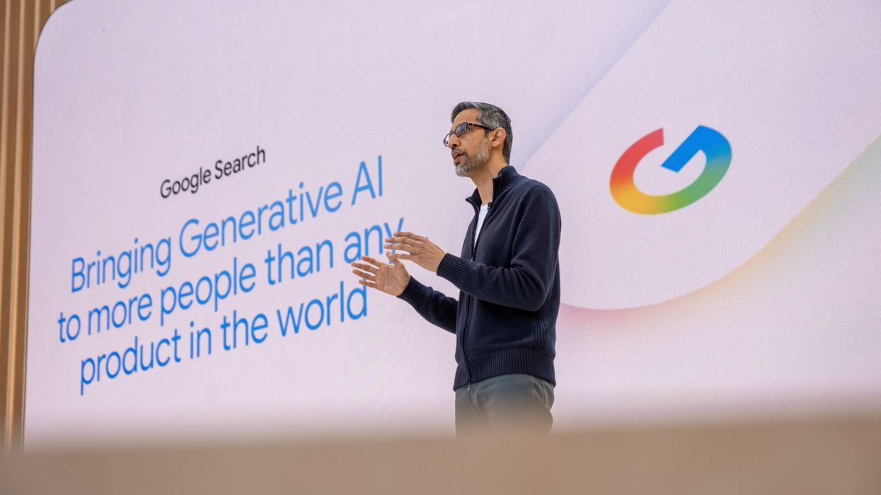 Google CEO Sundar Pichai speaking on-stage at Google I/O 2025